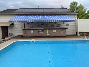 Blue Striped Awning By Pool
