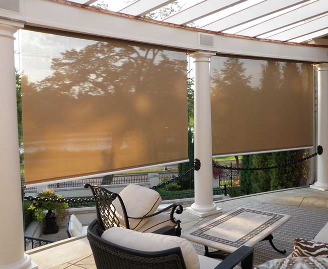Outdoor Patio Space Protected From Sun Thanks To The Sunroll Retractable Screen