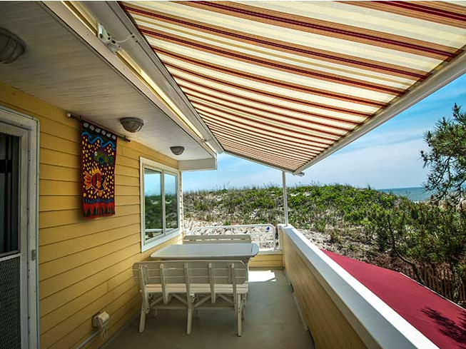The Sunplus Providing Shade To An Outdoor Patio